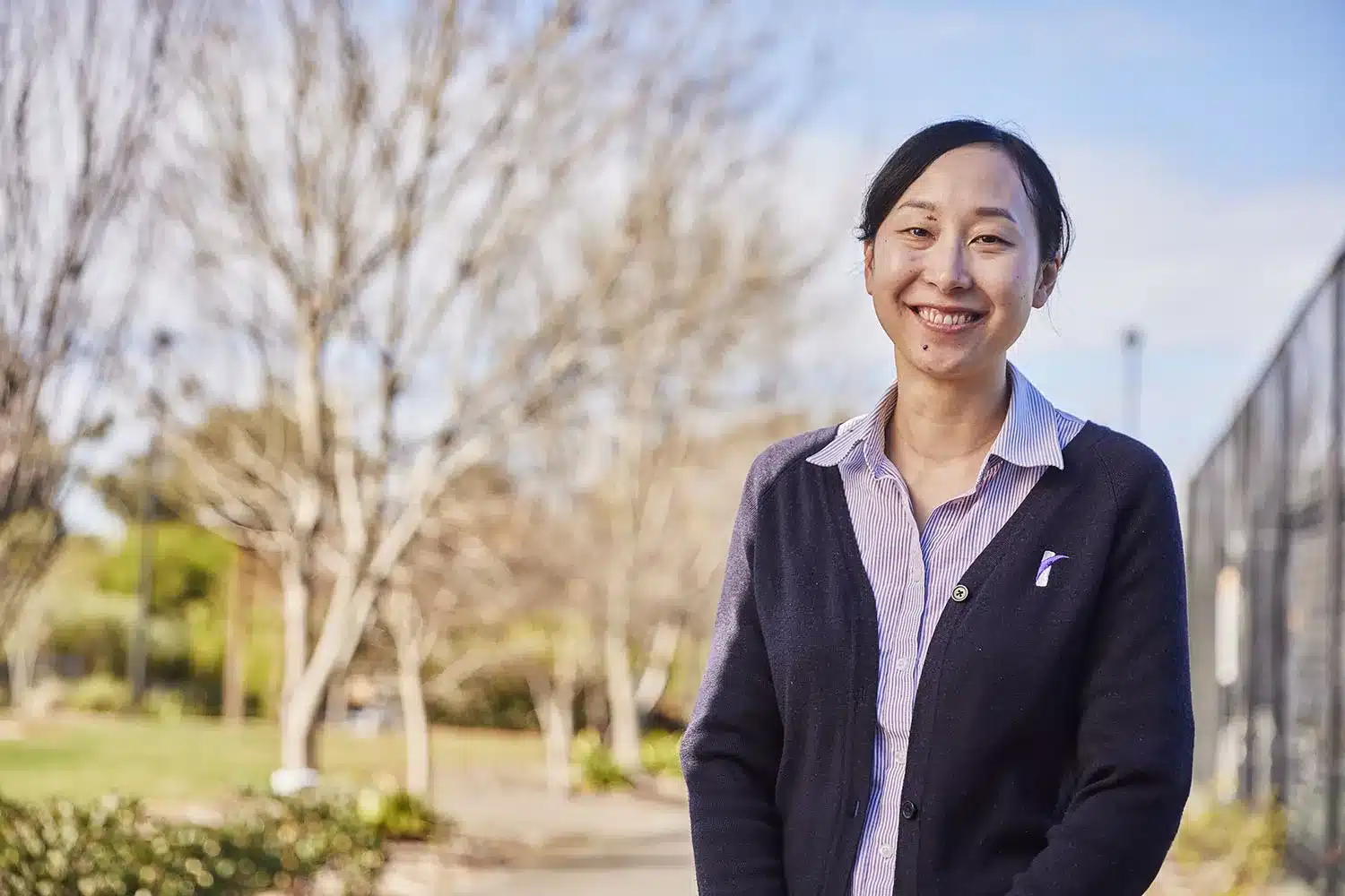 Researcher Jacinda Choy smiling at a camera.
